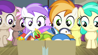 Foals looking at box of party favors S4E19