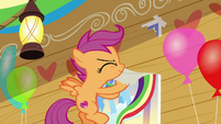 Scootaloo taking down a Rainbow poster S8E20