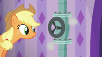 Applejack looking at leaky pipe S6E10