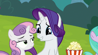 Rarity looking excitedly at Sweetie Belle S7E6