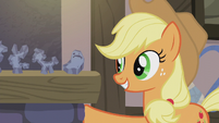 Applejack places her rock doll on the fireplace S5E20