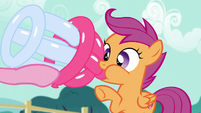 Balloon baby bottle inserted into Scootaloo's mouth S5E19