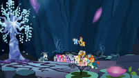 Element bearers and Pillars next to Tree of Harmony S7E26