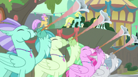 Hippogriffs playing trumpets S8E6.png (1.05 MB) Hippogriffs playing trumpets S8E6