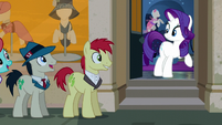 Rarity looking at long line of ponies S6E9