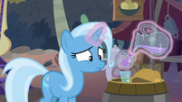 Trixie pouring a glass of juice S8E19