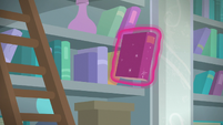 Book floating off of Twilight's shelf S8E25