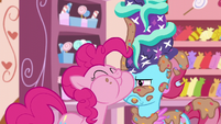 Pinkie Pie eating a chunk of the cake S6E6