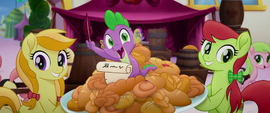 Spike on a large plate of baked bread MLPTM