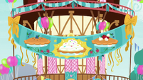 Banner at Pinkie Pie's pie-eating party S7E23