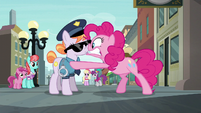 Pinkie Pie panicking in the officer's face S6E3