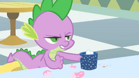 Spike drowning his anger in hot cocoa (presumably) and donuts.