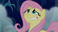 Fluttershy giving a nervous grin S6E15