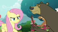 Fluttershy looking closely at Rarity's leaf wig S7E19