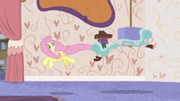 Fluttershy playing with the chaise lounge S7E12