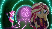 Pinkie frolicking behind Sunset Shimmer EGSBP