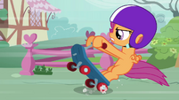 Scootaloo landing back on her scooter S3E6