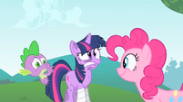Pinkie Pie's twitches makes Spike scared.