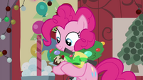 Pinkie looking at stuff in her hooves BGES2