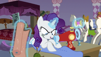 Rarity sewing with a demented expression S7E14