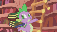 Spike carrying books up the ladder S1E10