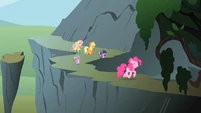 Pinkie happily leads the way home.