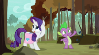 Rarity straightens mane; Spike waves to Peewee S8E11