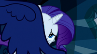 Luna holds Rarity back with her wing S5E13