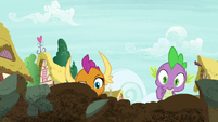 Spike and Smolder look at the crater S8E24