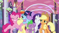 Twilight Sparkle hugging her friends S9E17
