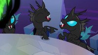 Changelings laughing in the castle throne room S6E25