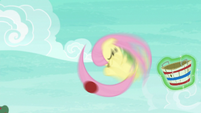 Fluttershy catches the ball with her tail S6E18