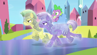 Spike being carried away by royal guards S4E24