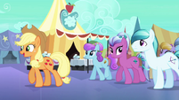 Applejack guides Crystal Ponies through the Faire S3E01