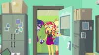 Sunset Shimmer opens the yearbook room door EGFF