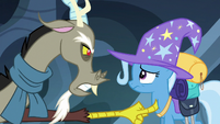 Discord poking Trixie with his claw S6E25