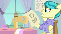 Lofty looking at her sewing concepts S9E12