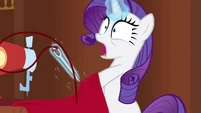 Rarity accidentally pokes herself.