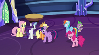 Twilight sadly walks past her friends S9E26