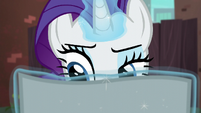 Rarity still reading the flyer S5E16