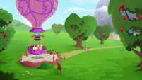 Rainbow and Pinkie rolling toward balloon MLPRR