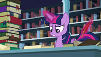 Twilight about to write down on a piece of paper S6E2