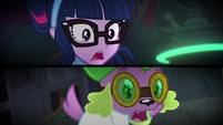 Twilight and Spike look at the capsule SS5
