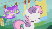 Sweetie Belle hanging up Rarity's sweater S2E5