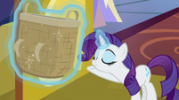 Rarity offering the big basket to Spike S9E19