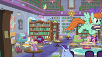 School of Friendship students in the library S8E11