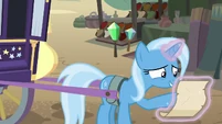 Trixie looks at her list of supplies S8E19