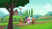 Celestia and Luna on a peach cart ride S9E13