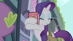 Rarity hugging the book S4E23