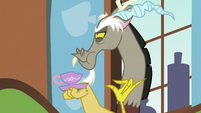 Discord chewing on a teacup S5E7